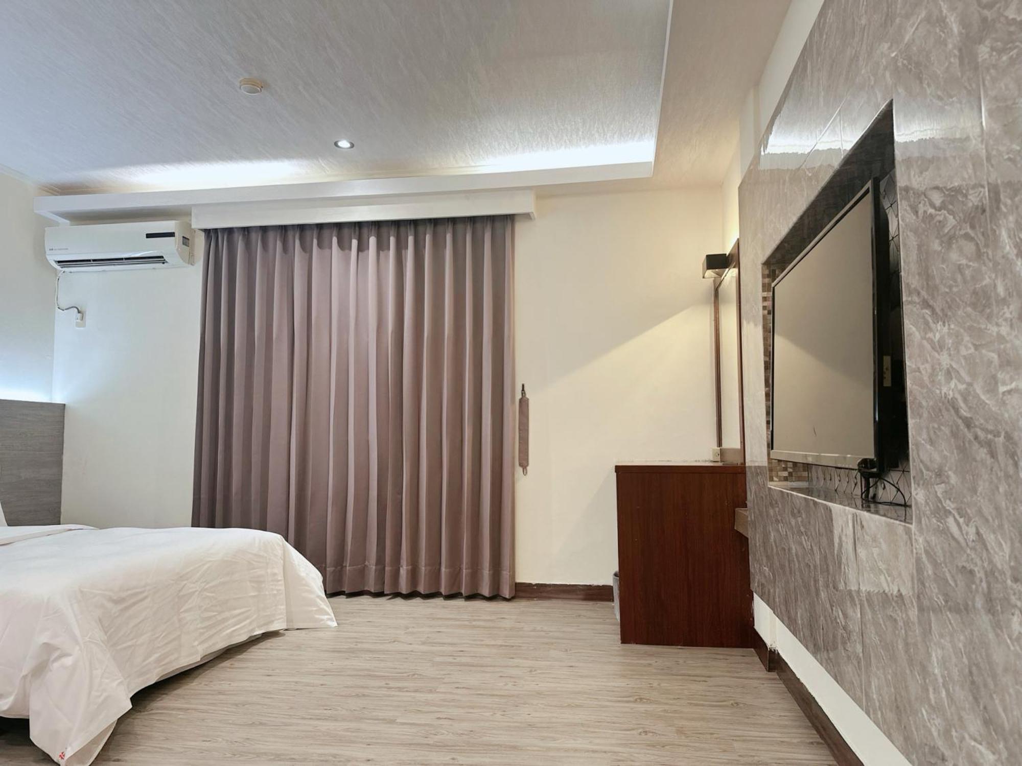 Hua Du Motel Jiji Exterior foto